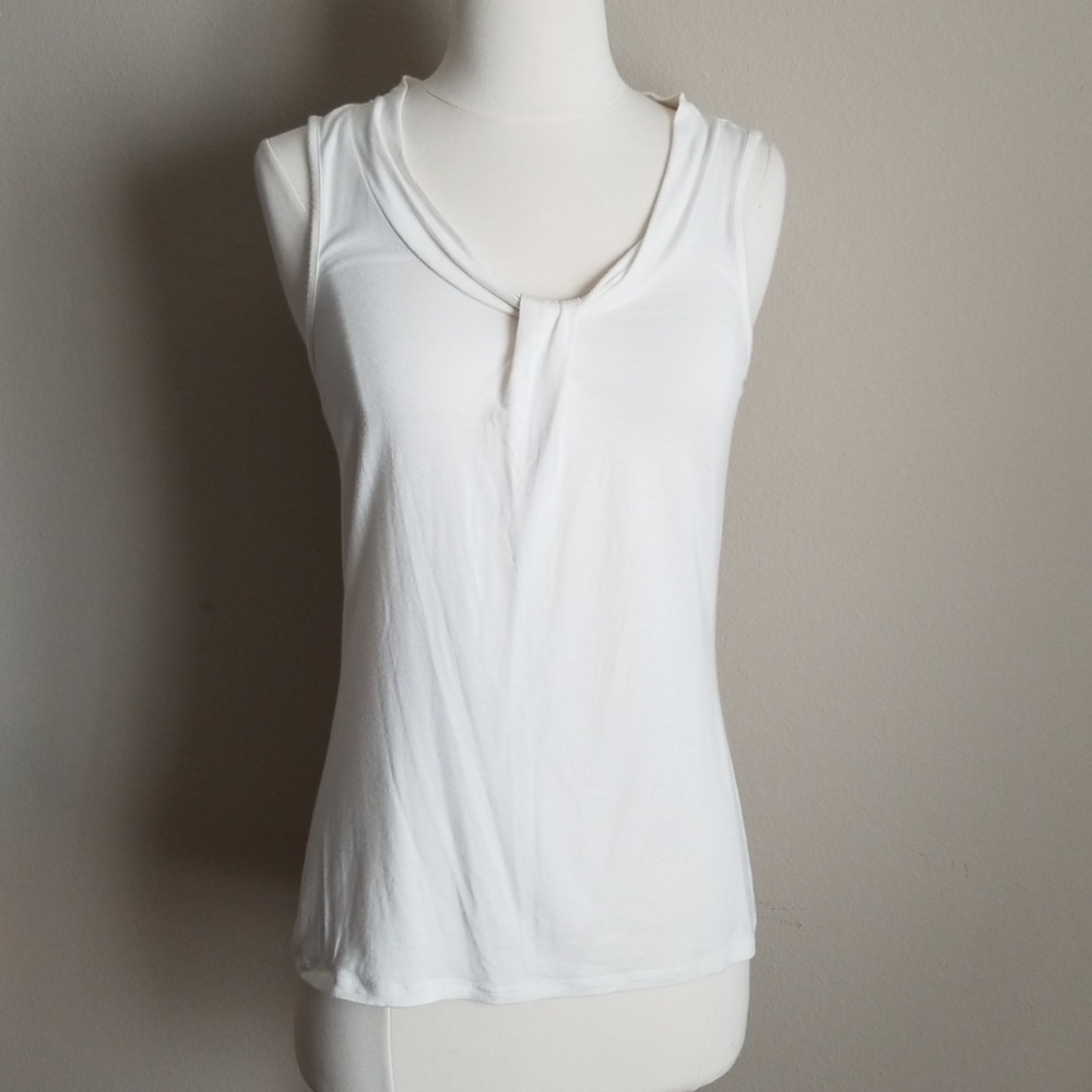 White sleeveless top